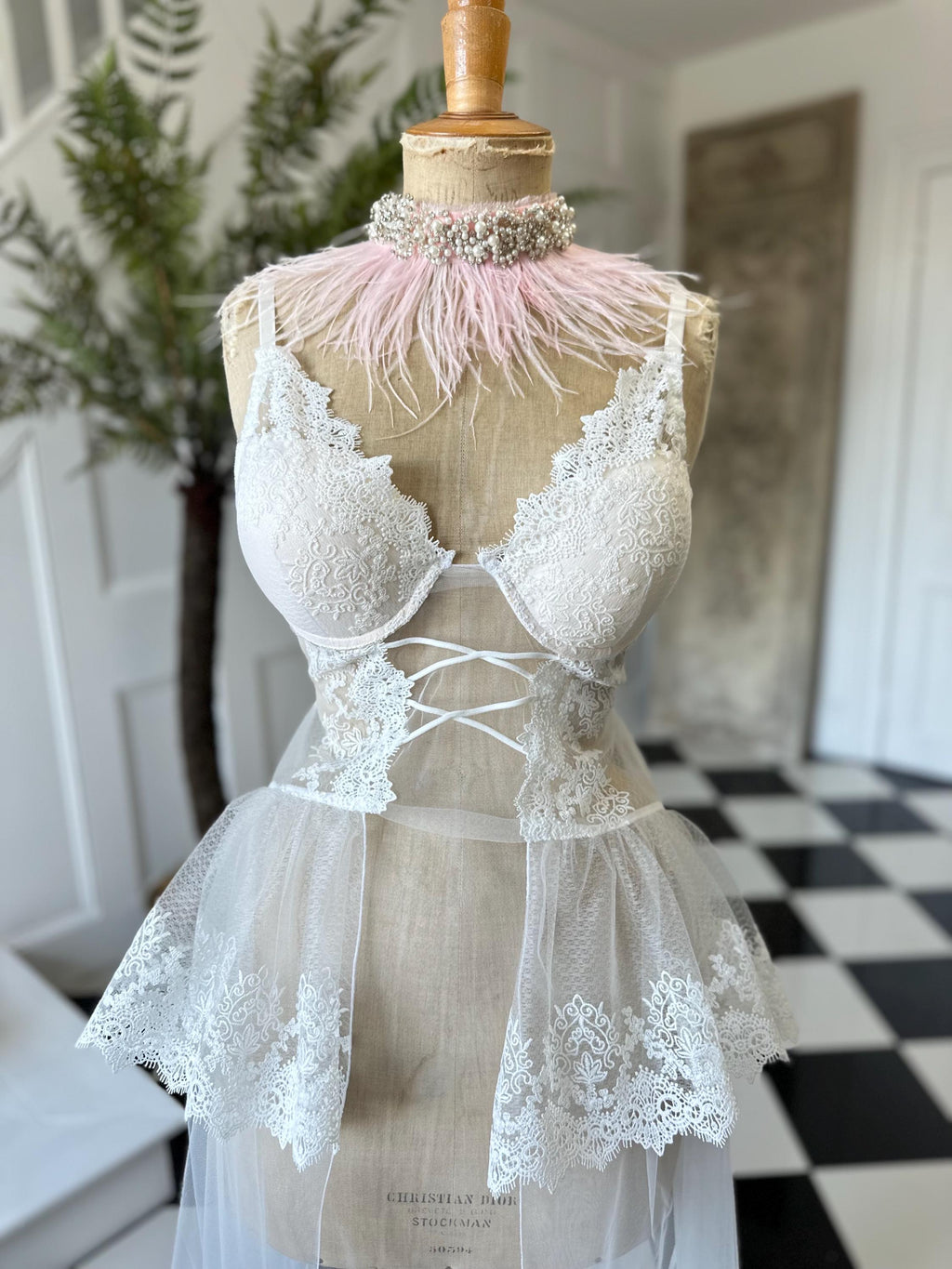 The Seraphina corded lace bridal bustier gown with scolloped peplum and tiered tulle