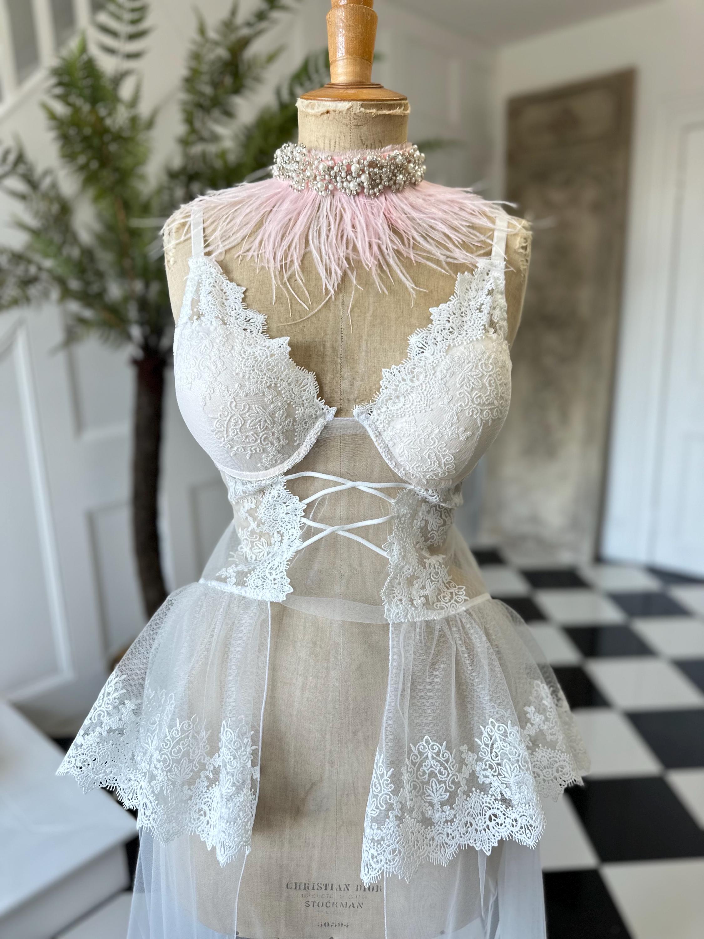 The Seraphina corded lace bridal bustier gown with scolloped peplum and tiered tulle