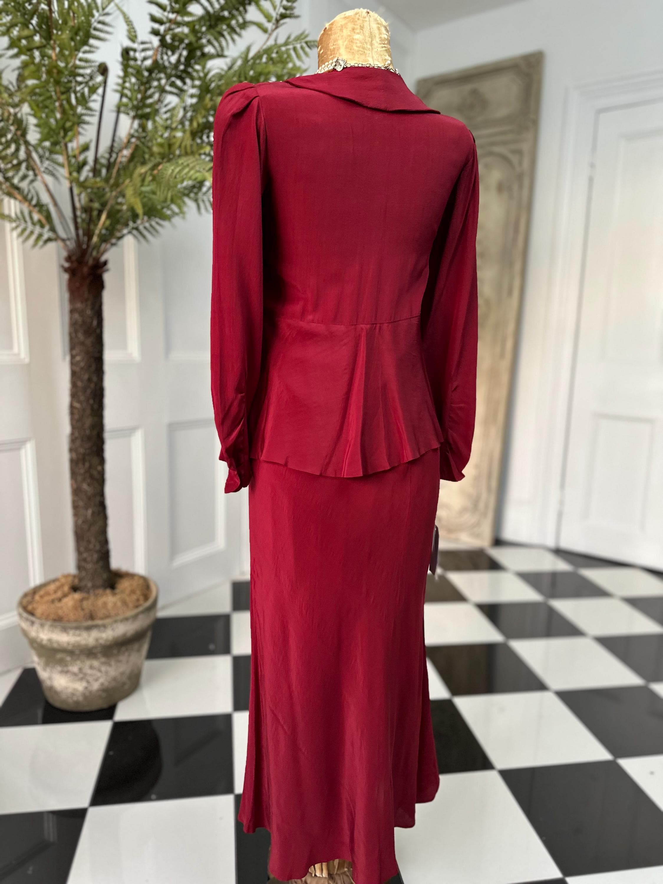 1940 Ruby red peplum dress with silk corsage