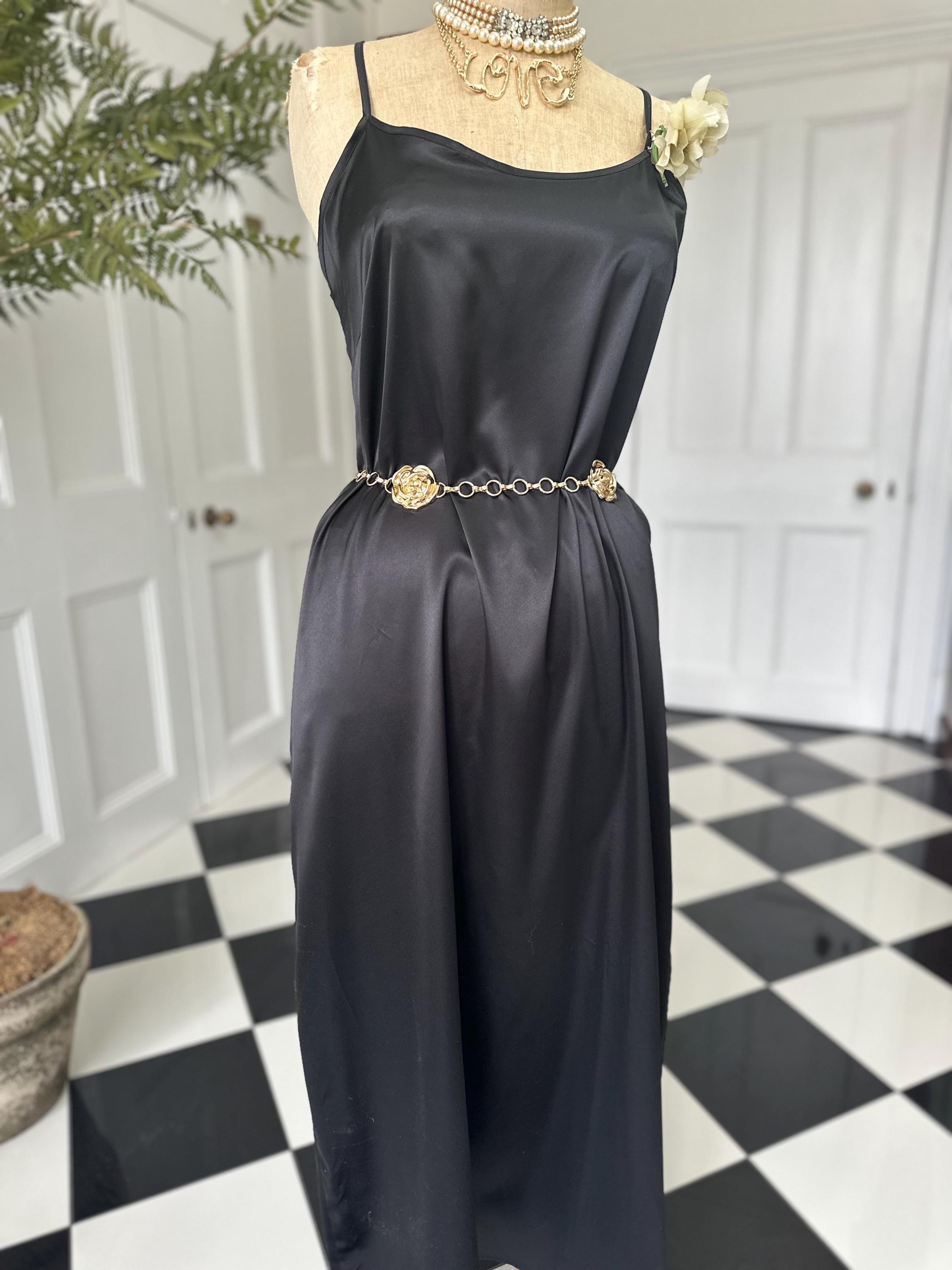 Vintage style long bias cut black slip dress.
