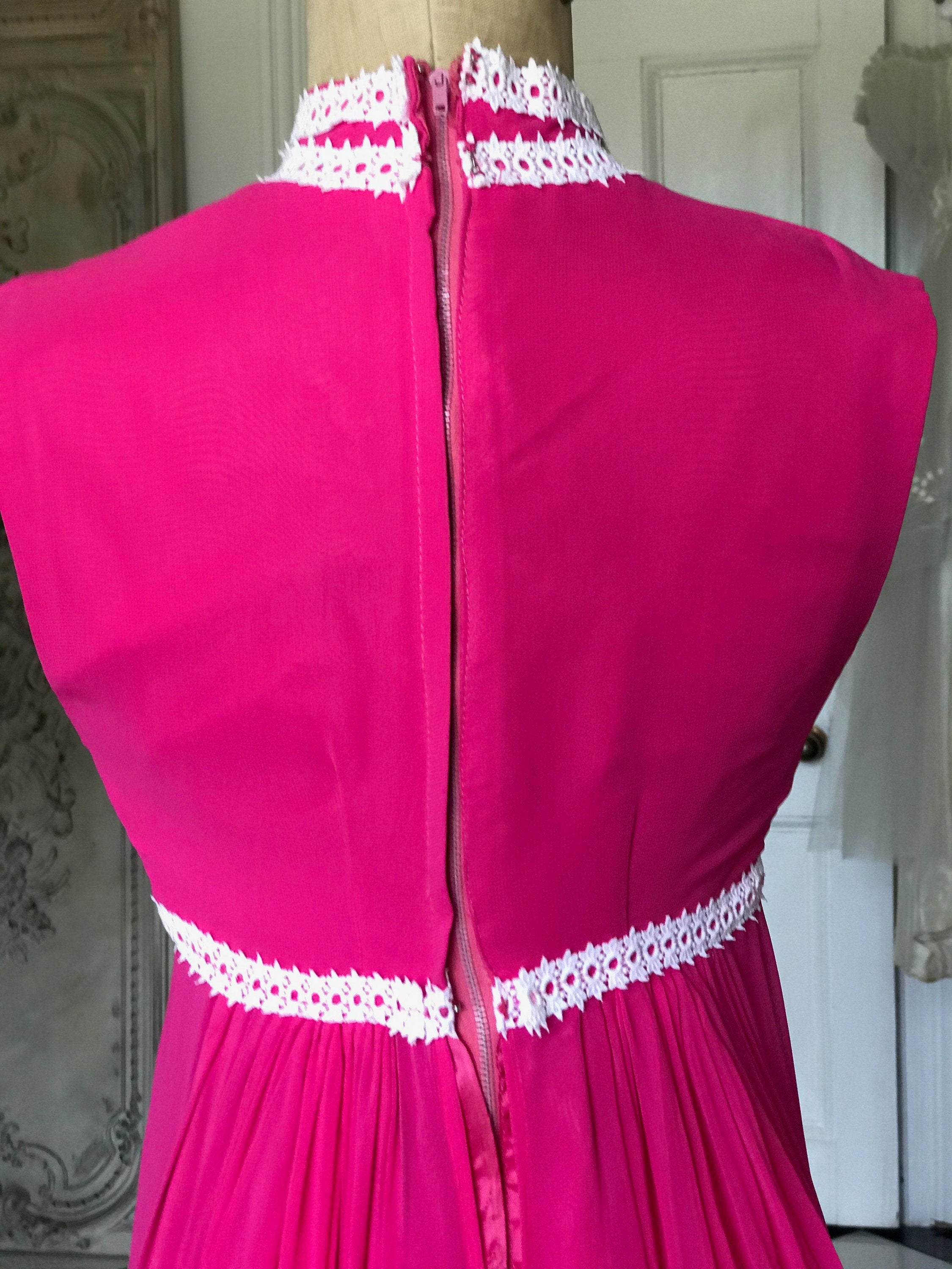Vintage 1970s Sleeveless hot pink chiffon maxi dress with pearl buttons
