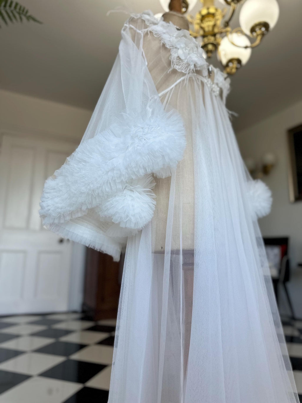 The Aurelia applique 3D floral tulle couture robe with voluminous ruffle sleeves