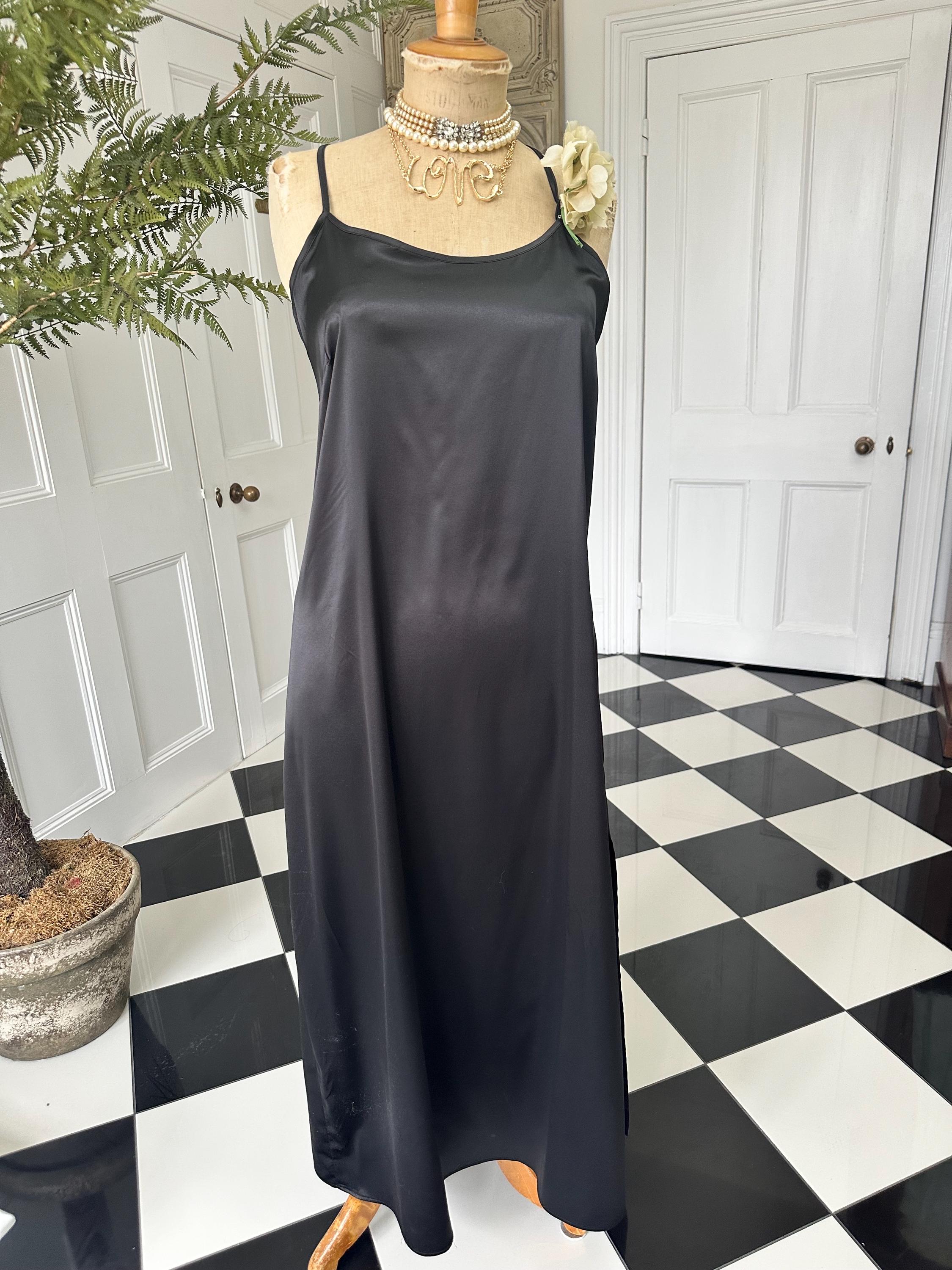 Vintage style long bias cut black slip dress.