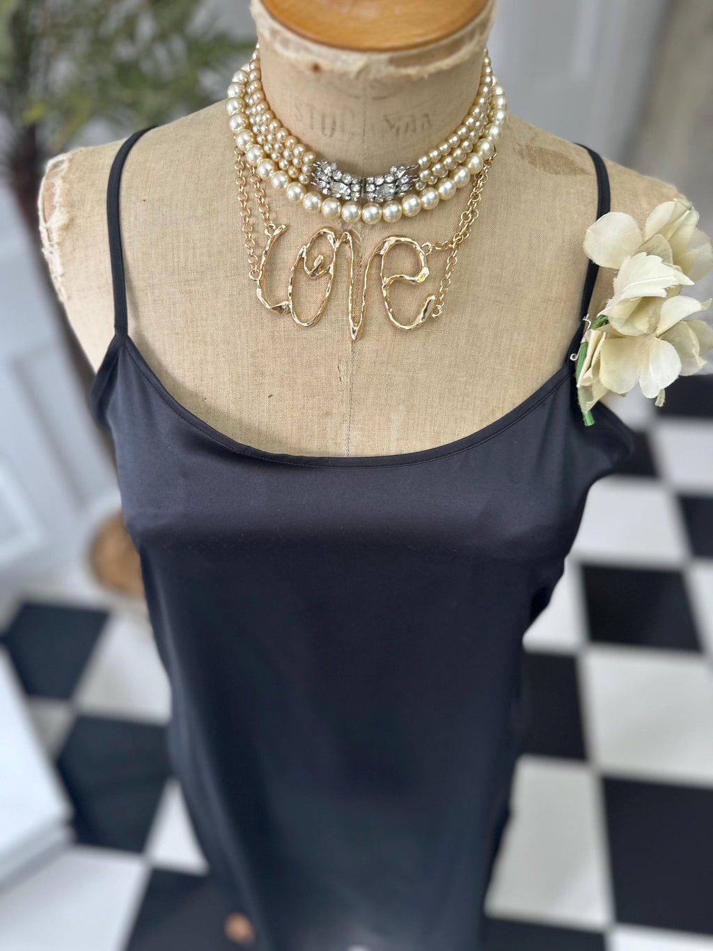 Vintage style long bias cut black slip dress.