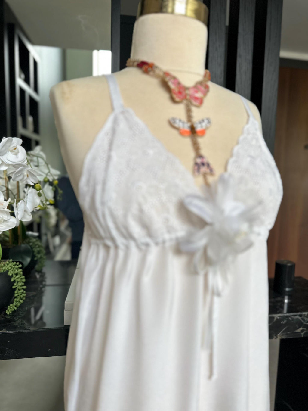 1970s white long satin slip dress with embroidery to the front.