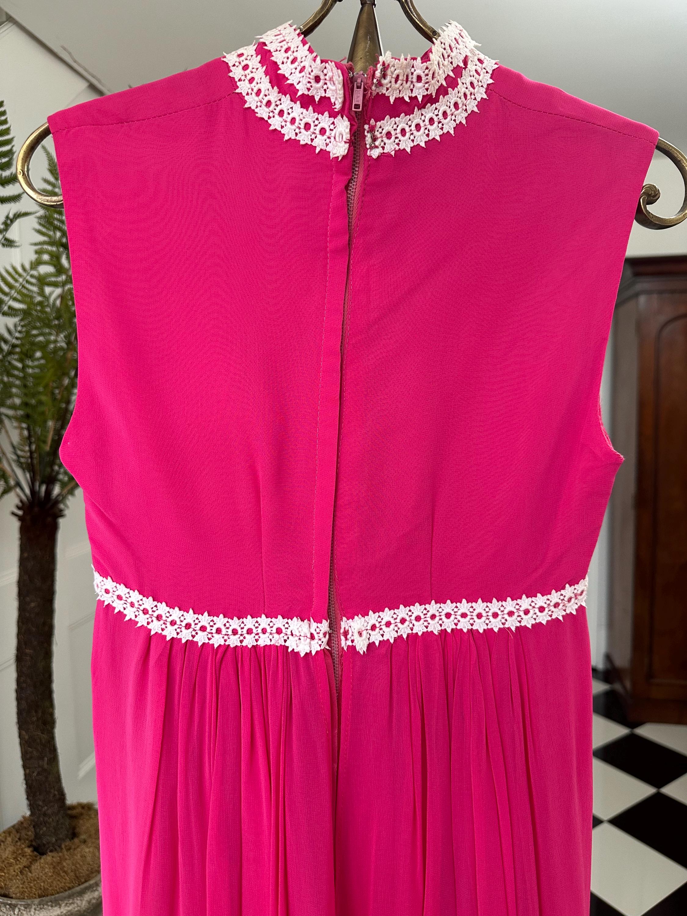 Vintage 1970s Sleeveless hot pink chiffon maxi dress with pearl buttons