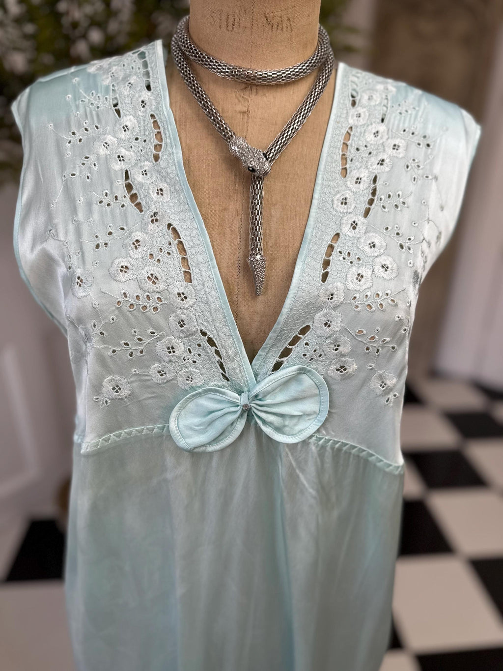 1980s seafoam green long dress with embroidery and plunge neckline