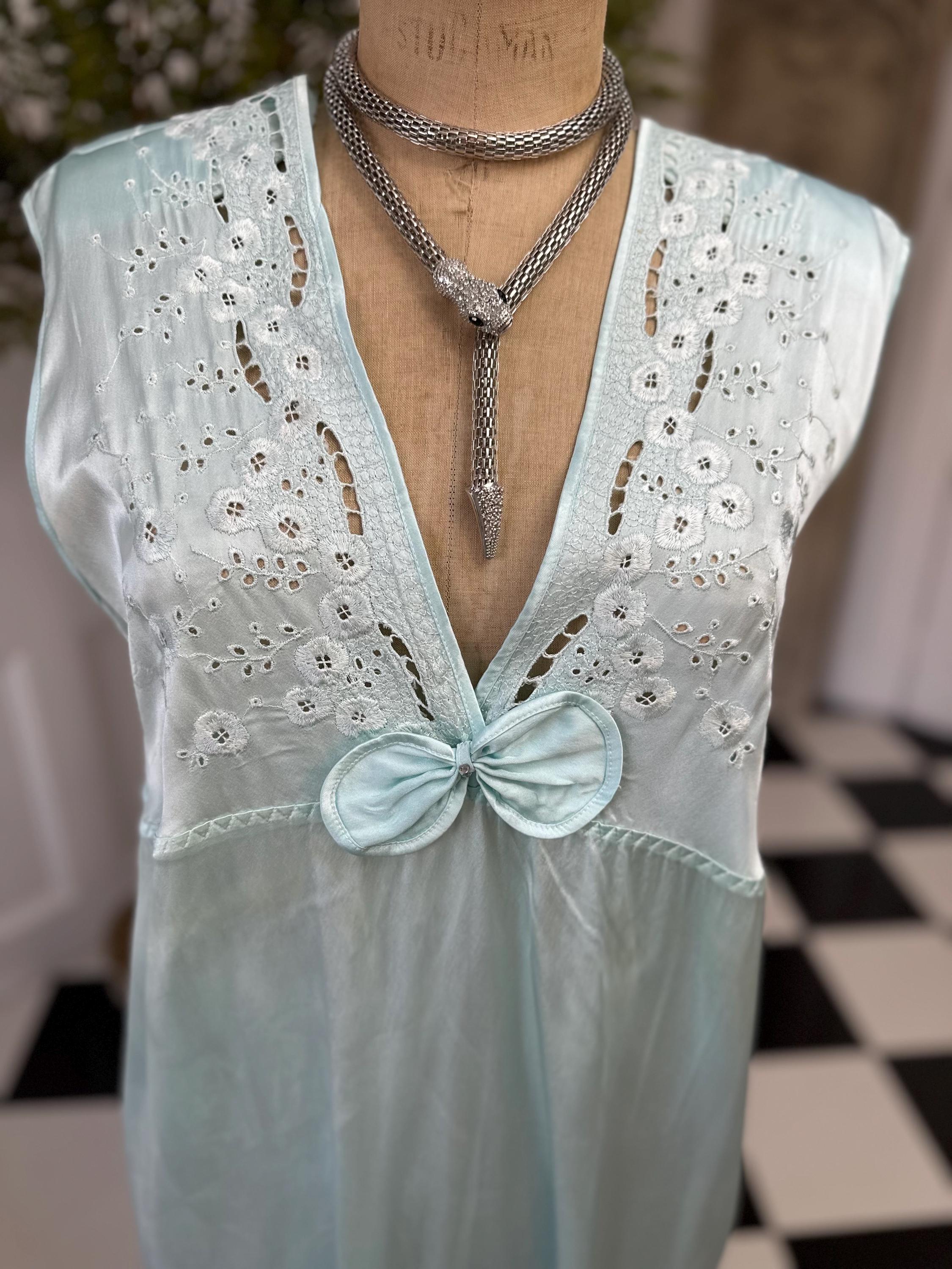 1980s seafoam green long dress with embroidery and plunge neckline