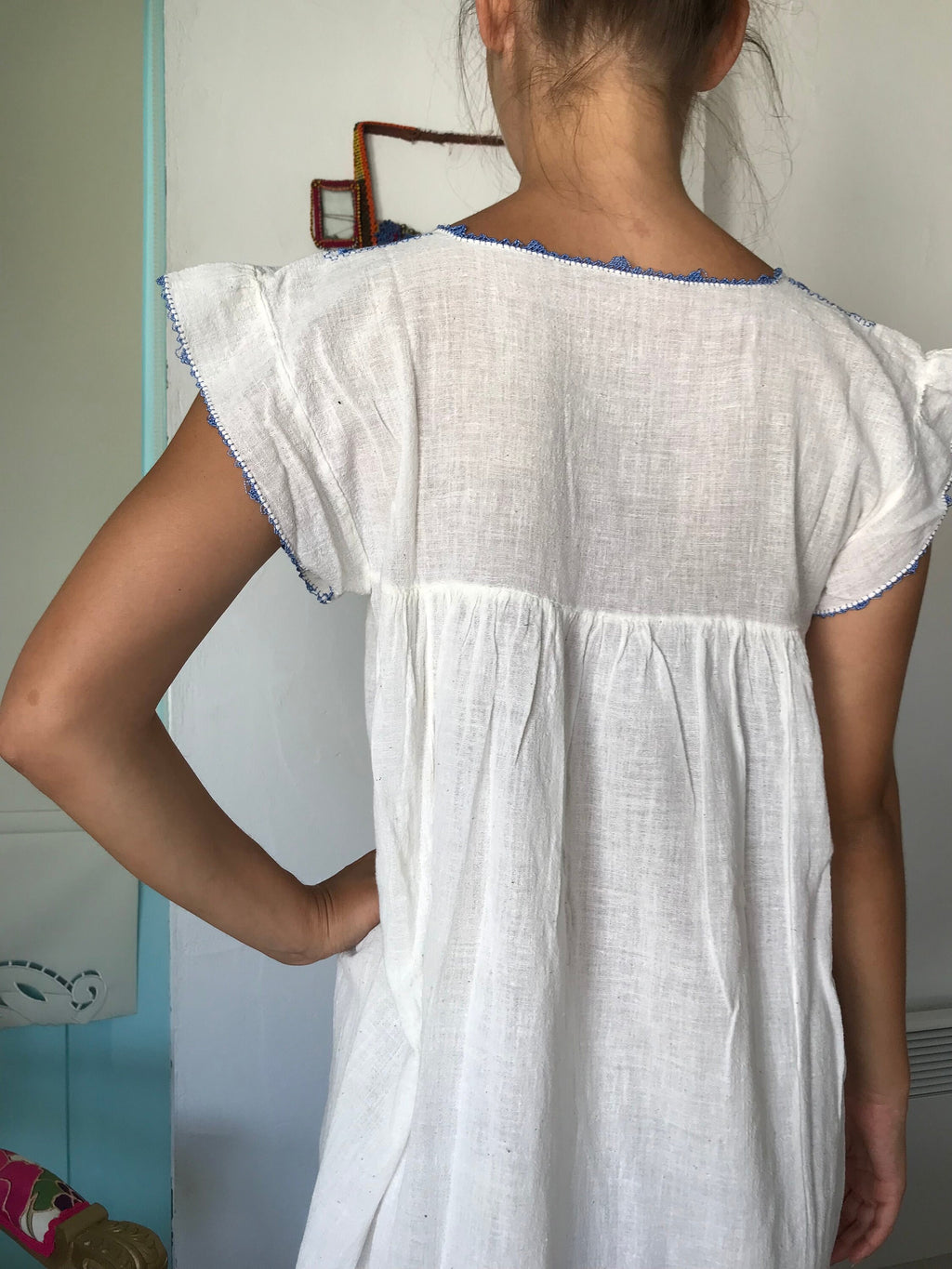 1970s hand loomed muslin dress with hand embroidered smock style