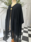 1970s black poncho 100% cashmere as stated on the label