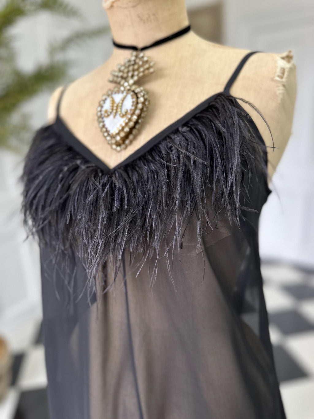 Vintage inspired black sheet chiffon high low slip dress with ostrich feather
