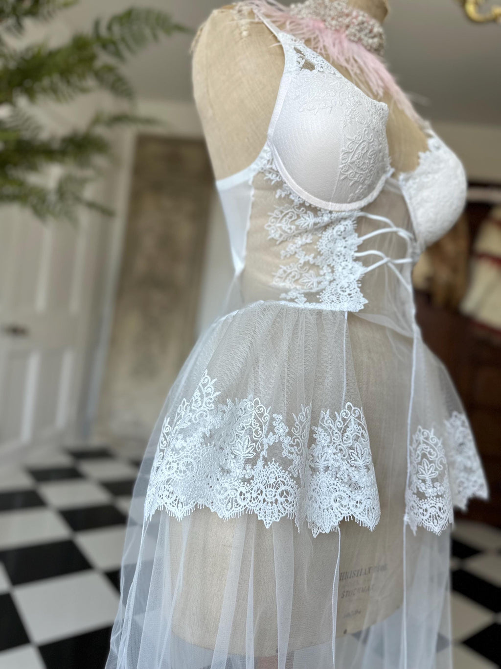 The Seraphina corded lace bridal bustier gown with scolloped peplum and tiered tulle