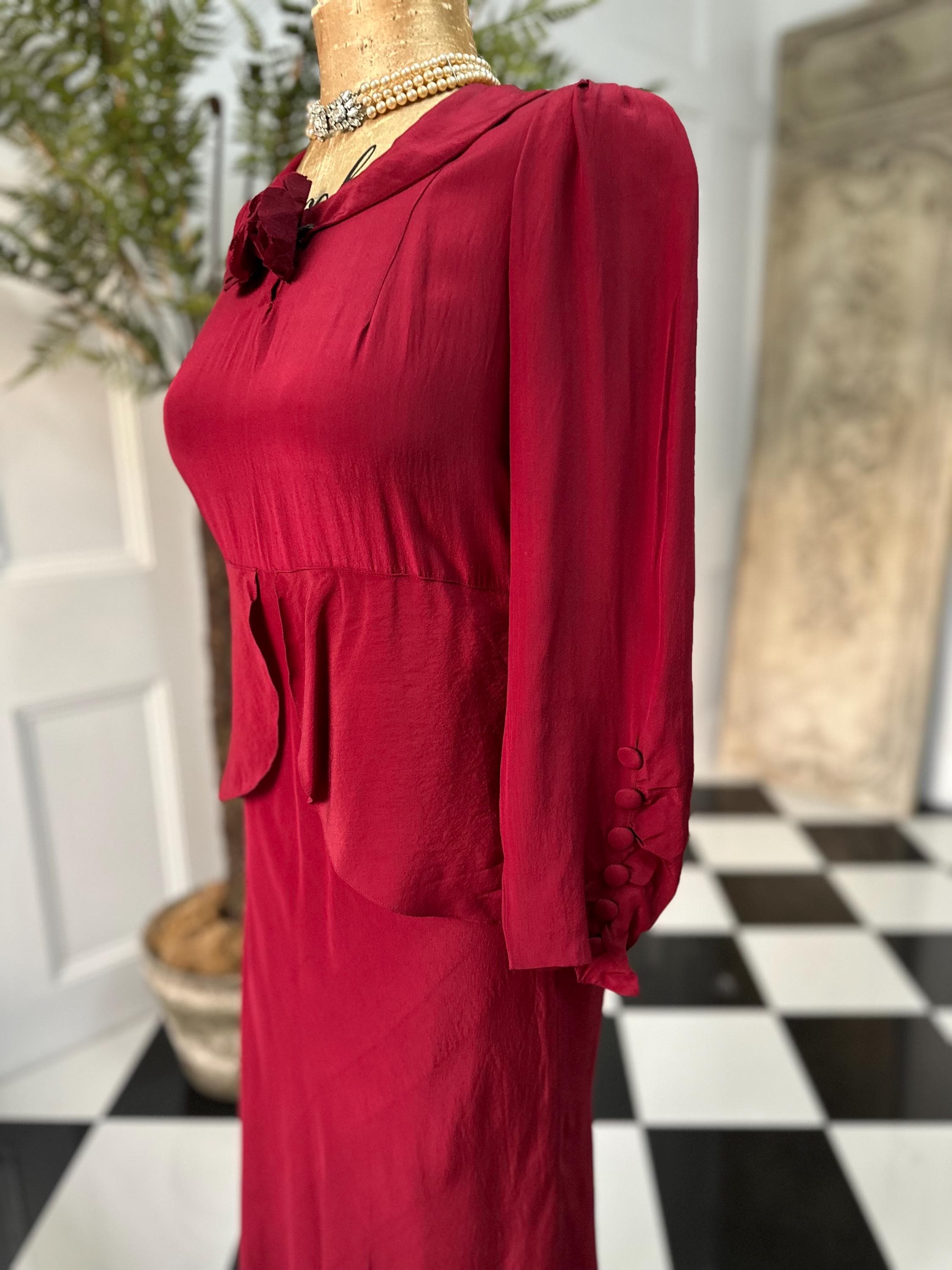 1940 Ruby red peplum dress with silk corsage