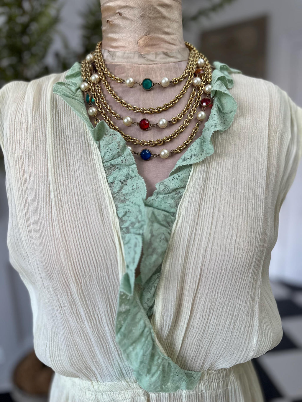 1970s plunge neckline dress in silk crepe  and lace in pale green